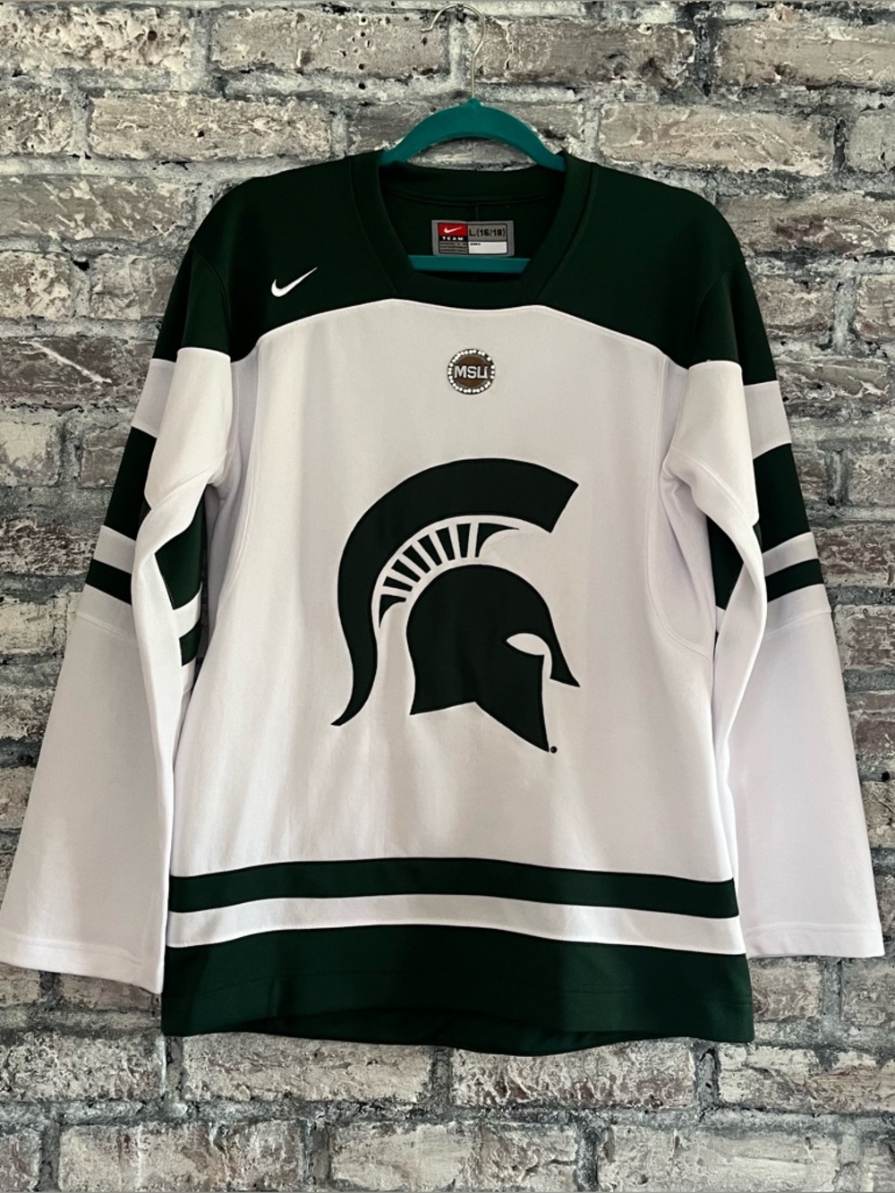 Nike White/Dark Green Michigan State Spartan Hockey Jersey smoke/pet free Unisex